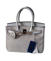 MaxSold Auction: Cowhide leather satchel with crossbody strap - Ottawa (Ontario, Canada) SELLER MANAGED Downsizing Online Auction - Darvoy Mews