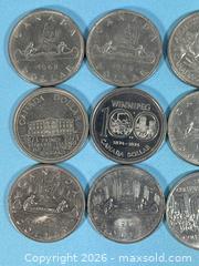MaxSold Auction: Canada 1 Dollar Coins - 15 Mixed Dates 1960s–1980s - Lincoln (Ontario, Canada) SELLER MANAGED Downsizing Online Auction - Bartlett Road - Beamsville (STORAGE)