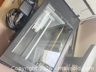 MaxSold Auction: Epson Perfection V600 Photo Scanner + film scanning accessories - Toronto (Ontario, Canada) SELLER MANAGED Downsizing Online Auction -  Bathurst Street (CONDO)