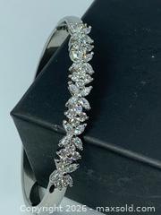 MaxSold Auction: Mixed?Cut Cubic Zirconia .925 Sterling Silver Bangle bracelet  - Toronto (Ontario, Canada) SELLER MANAGED Downsizing Online Auction -  Queen Street East