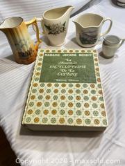 MaxSold Auction: Madame Jehane Benoit Edition Deluxe Hardcover Cookbook + 4 Ceramic Pitchers - Ottawa (Ontario, Canada) SELLER MANAGED Downsizing Online Auction - Sarsfield Road