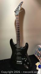 MaxSold Auction: Degas Strat-Style Solid-Body Electric Guitar, Black - Whitby (Ontario, Canada) SELLER MANAGED Downsizing Online Auction - Toscana Dr.