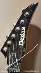 MaxSold Auction: Degas Strat-Style Solid-Body Electric Guitar, Black - Whitby (Ontario, Canada) SELLER MANAGED Downsizing Online Auction - Toscana Dr.