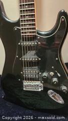 MaxSold Auction: Degas Strat-Style Solid-Body Electric Guitar, Black - Whitby (Ontario, Canada) SELLER MANAGED Downsizing Online Auction - Toscana Dr.