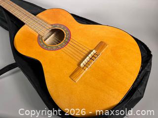 MaxSold Auction: Classical Guitar With Gig Bag - Toronto (Ontario, Canada) SELLER MANAGED Reseller Online Auction - Chesswood Drive