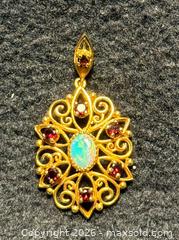 MaxSold Auction: 10K Gold Pendant with set opal and other stones - North Vancouver (British Columbia, Canada) SELLER MANAGED Moving Online Auction - Northlands Drive
