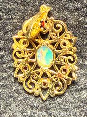 MaxSold Auction: 10K Gold Pendant with set opal and other stones - North Vancouver (British Columbia, Canada) SELLER MANAGED Moving Online Auction - Northlands Drive