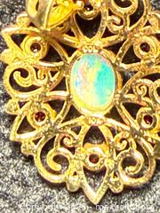 MaxSold Auction: 10K Gold Pendant with set opal and other stones - North Vancouver (British Columbia, Canada) SELLER MANAGED Moving Online Auction - Northlands Drive