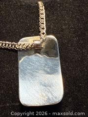MaxSold Auction: Indigenous carved sterling silver pendant - North Vancouver (British Columbia, Canada) SELLER MANAGED Moving Online Auction - Northlands Drive