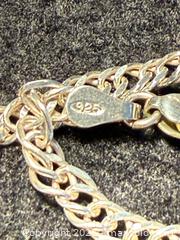 MaxSold Auction: Indigenous carved sterling silver pendant - North Vancouver (British Columbia, Canada) SELLER MANAGED Moving Online Auction - Northlands Drive