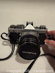 MaxSold Auction: Vintage Olympus OM-1 Camera - North Vancouver (British Columbia, Canada) SELLER MANAGED Moving Online Auction - Northlands Drive