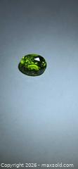 MaxSold Auction: AAA vivid green Peridot  - Toronto (Ontario, Canada) PARTNER MANAGED Reseller Online Auction - Gerrard Street