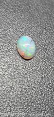 MaxSold Auction: RARE!! 1.64CT Oval cab Rutile opal - Toronto (Ontario, Canada) PARTNER MANAGED Reseller Online Auction - Gerrard Street
