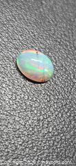 MaxSold Auction: RARE!! 1.64CT Oval cab Rutile opal - Toronto (Ontario, Canada) PARTNER MANAGED Reseller Online Auction - Gerrard Street