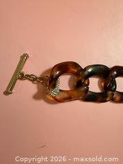 MaxSold Auction: Brown plastic & gold toned diamond bracelet   - Warwick Township (Pennsylvania, USA) SELLER MANAGED Estate Sale Online Auction -  Crocker Lane