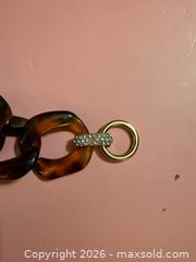 MaxSold Auction: Brown plastic & gold toned diamond bracelet   - Warwick Township (Pennsylvania, USA) SELLER MANAGED Estate Sale Online Auction -  Crocker Lane