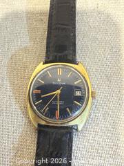 MaxSold Auction: Bulova Automatic Wristwatch Gold Tone Case Dark Blue Dial 23 jewels and date  - Toronto (Ontario, Canada) SELLER MANAGED Downsizing Online Auction - Weston Road (CONDO)
