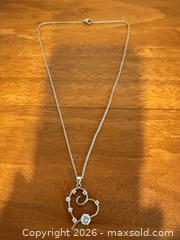 MaxSold Auction: Sterling Silver Heart Pendant Necklace with Cubic Zirconia, 16” - Toronto (Ontario, Canada) SELLER MANAGED Downsizing Online Auction - Weston Road (CONDO)