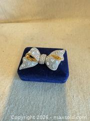 MaxSold Auction: Swarovski Gold-Plated Bow Brooch Pin, About 3 in (7.5 cm)marked  - Toronto (Ontario, Canada) SELLER MANAGED Downsizing Online Auction - Weston Road (CONDO)