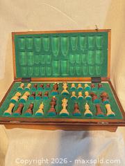 MaxSold Auction: Wood Carved Chess Set with Folding Board & Storage 16”/16” - Toronto (Ontario, Canada) SELLER MANAGED Downsizing Online Auction - Weston Road (CONDO)