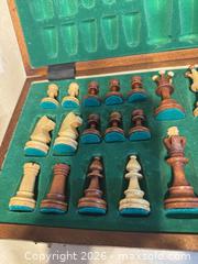 MaxSold Auction: Wood Carved Chess Set with Folding Board & Storage 16”/16” - Toronto (Ontario, Canada) SELLER MANAGED Downsizing Online Auction - Weston Road (CONDO)