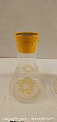 MaxSold Auction: Vintage PYREX Beaker Carafe Pitcher + Lid Atomic Starburst, Glass Gold MCM - Campbell (California, USA) PARTNER MANAGED Estate Sale Online Auction - Dell Avenue