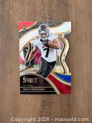 MaxSold Auction: 2023 Panini Select Bijan Robinson Die Cut Rookie Card - Oshawa (Ontario, Canada) SELLER MANAGED Reseller Online Auction - Margaret Street