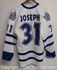 MaxSold Auction: CCM Toronto Maple Leafs Curtis Joseph #31 Men's Large Hockey Jersey - Toronto (Ontario, Canada) PARTNER MANAGED Reseller Online Auction - Queen Street West.