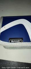 MaxSold Auction: Blue Nintendo DS switch'N'carry Case, Bag, and Pen Set - Walworth (New York, USA) SELLER MANAGED Downsizing Online Auction - High Street