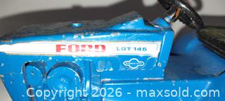MaxSold Auction: Vintage blue Ford hydrostatic LGT145 die-cast toy tractor  - Walworth (New York, USA) SELLER MANAGED Downsizing Online Auction - High Street