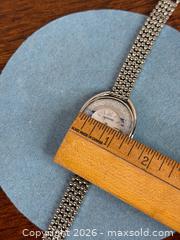 MaxSold Auction: Swarovski 'Crystalline Oval' Silver Tone Watch - Hamilton (Ontario, Canada) SELLER MANAGED Estate Sale Online Auction - Gertrude Street