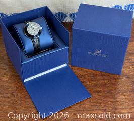 MaxSold Auction: Swarovski Women's 'Octea Crystal' Black Leather Watch - Hamilton (Ontario, Canada) SELLER MANAGED Estate Sale Online Auction - Gertrude Street