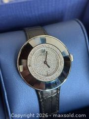 MaxSold Auction: Swarovski Women's 'Octea Crystal' Black Leather Watch - Hamilton (Ontario, Canada) SELLER MANAGED Estate Sale Online Auction - Gertrude Street