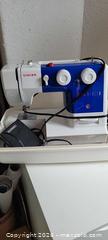 MaxSold Auction: Singer Sewing Machine with Hard Carrying Case - Hamilton (Ontario, Canada) SELLER MANAGED Reseller Online Auction - East Avenue North