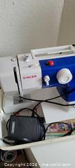 MaxSold Auction: Singer Sewing Machine with Hard Carrying Case - Hamilton (Ontario, Canada) SELLER MANAGED Reseller Online Auction - East Avenue North