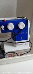 MaxSold Auction: Singer Sewing Machine with Hard Carrying Case - Hamilton (Ontario, Canada) SELLER MANAGED Reseller Online Auction - East Avenue North