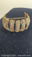 MaxSold Auction: Stunning Gold Finish Swarovski Crystal like Bangld  - Toronto (Ontario, Canada) SELLER MANAGED Estate Sale Online Auction -  Saunders Road