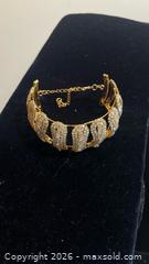 MaxSold Auction: Stunning Gold Finish Swarovski Crystal like Bangld  - Toronto (Ontario, Canada) SELLER MANAGED Estate Sale Online Auction -  Saunders Road