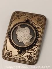 MaxSold Auction: Vintage Morgan Silver Dollar Belt Buckle - Nanaimo (British Columbia, Canada) SELLER MANAGED Downsizing Online Auction - Fillinger Crescent