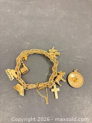 MaxSold Auction: Gold Charm Bracelet - Surrey (British Columbia, Canada) PARTNER MANAGED Downsizing Online Auction - 16 Avenue