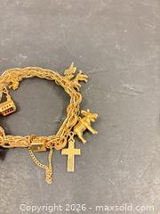 MaxSold Auction: Gold Charm Bracelet - Surrey (British Columbia, Canada) PARTNER MANAGED Downsizing Online Auction - 16 Avenue