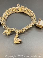 MaxSold Auction: Sterling Charm Bracelet - Surrey (British Columbia, Canada) PARTNER MANAGED Downsizing Online Auction - 16 Avenue
