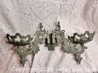 MaxSold Auction: Vintage Cast Iron Two-Arm Wall Mount Oil Lamp / Candle Holder - St. Catharines (Ontario, Canada) SELLER MANAGED Reseller Online Auction - Winfield Court