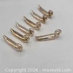 MaxSold Auction: Vintage Silver Plated Swan Cutting Utensil Rests (6+1) - St. Catharines (Ontario, Canada) SELLER MANAGED Reseller Online Auction - Winfield Court