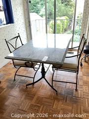 MaxSold Auction: Granite Top Dining Table with 2 Wrought Iron Chairs - Los Angeles (California, USA) PARTNER MANAGED Estate Sale Online Auction - Thurston Circle