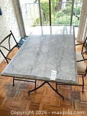 MaxSold Auction: Granite Top Dining Table with 2 Wrought Iron Chairs - Los Angeles (California, USA) PARTNER MANAGED Estate Sale Online Auction - Thurston Circle