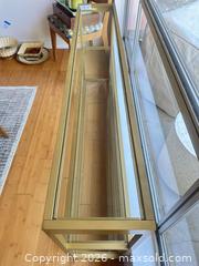 MaxSold Auction: Modern Gold Metal Console Table with Glass Shelves (10x55x29) - Thousand Oaks (California, USA) PARTNER MANAGED Estate Sale Online Auction - Camino Roberto