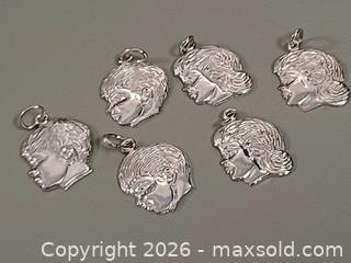 MaxSold Auction: 6 Vintage Sterling Silver Men & Women Charms Marked  - Toronto (Ontario, Canada) PARTNER MANAGED Reseller Online Auction - Queen Street West
