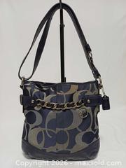MaxSold Auction: Coach Moto Op Art Navy Metallic Chain Duffle Shoulder Bag F19820 - Toronto (Ontario, Canada) PARTNER MANAGED Reseller Online Auction - Queen Street West