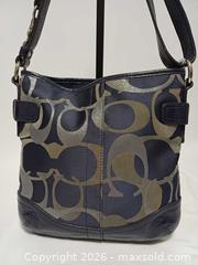 MaxSold Auction: Coach Moto Op Art Navy Metallic Chain Duffle Shoulder Bag F19820 - Toronto (Ontario, Canada) PARTNER MANAGED Reseller Online Auction - Queen Street West